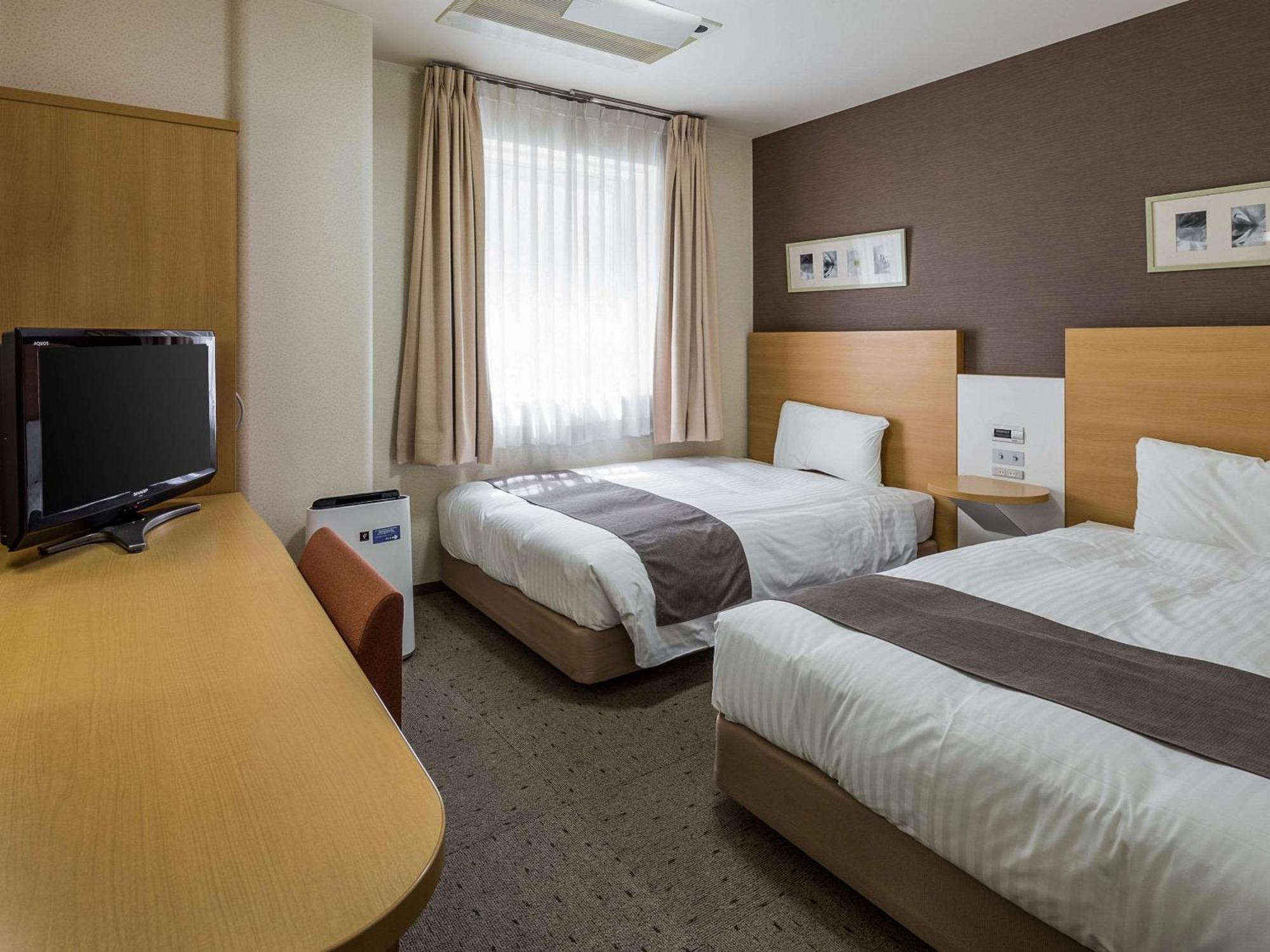 Comfort Hotel Tendo Bagian luar foto